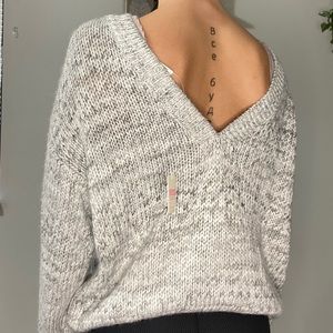 Knit sweater with v back